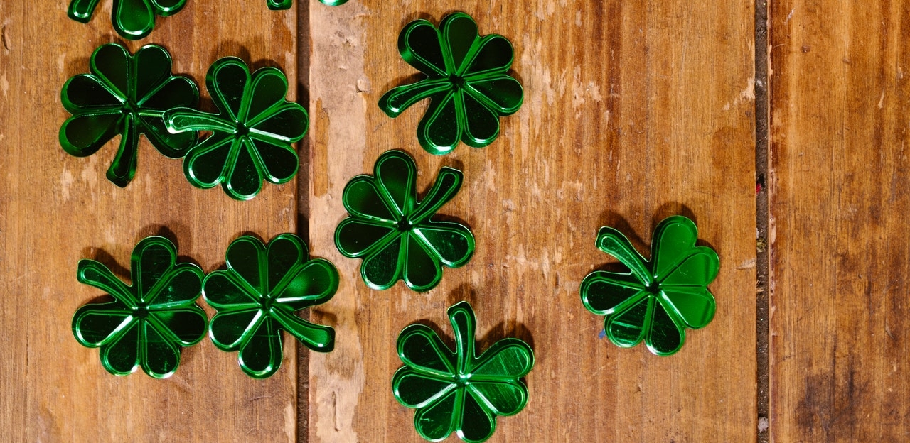 five leaf clovers on a table