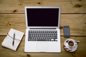 computer-smartphone-notebook-and-coffee