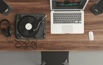 heaphones and recorder on a desk