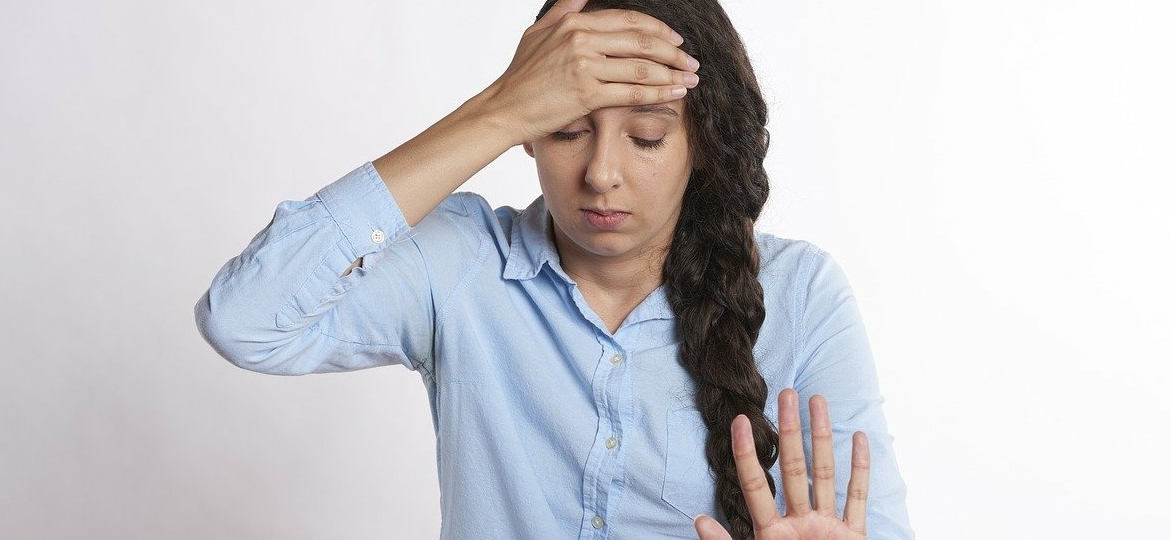 stressed-girl-hand-on-her-front