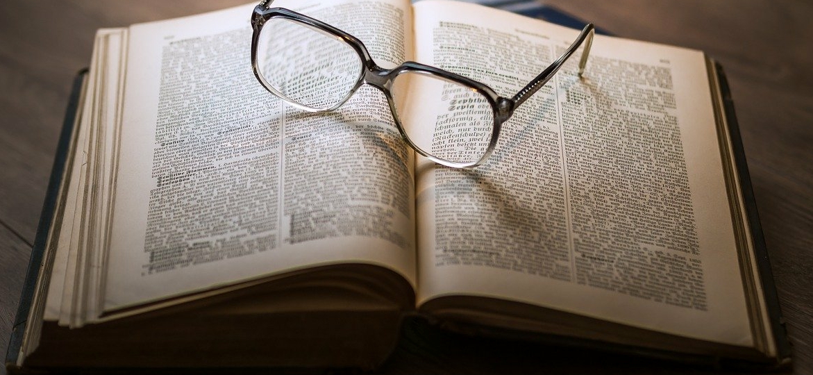 glasses-resting-on-a-book