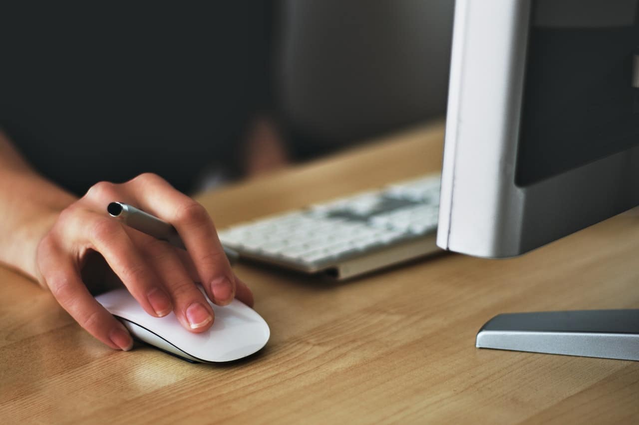 woman using a computer mouse