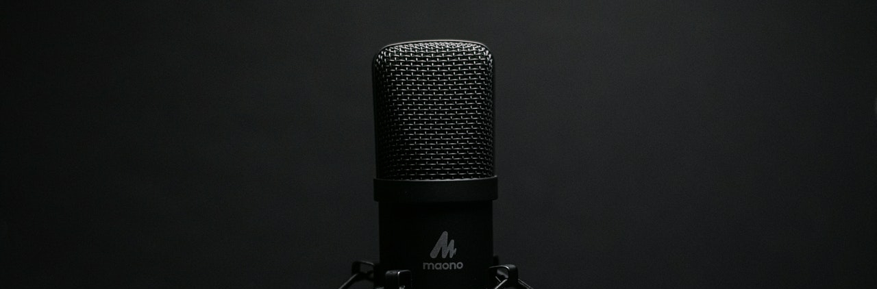 a microphone on a dark background