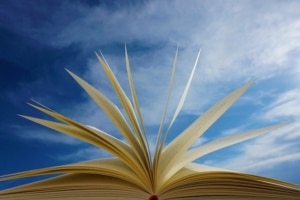 opened-book-under-a-blue-sky