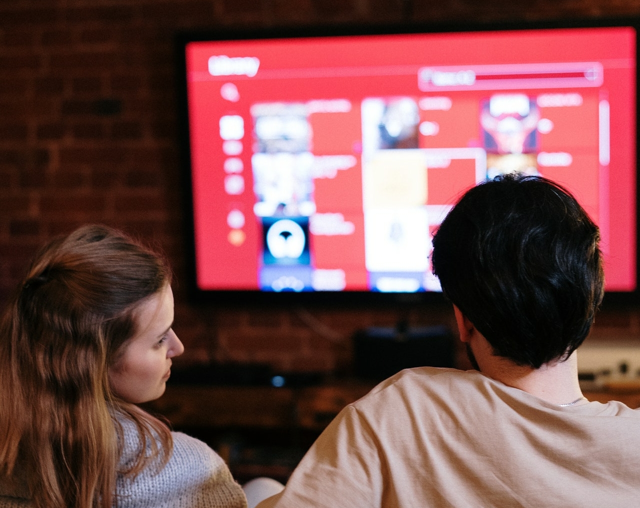 a couple watching the tv