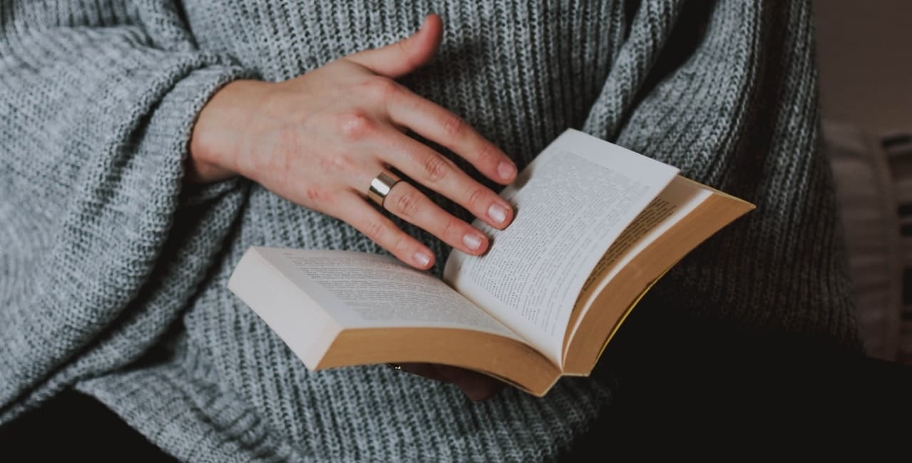 person holding a book