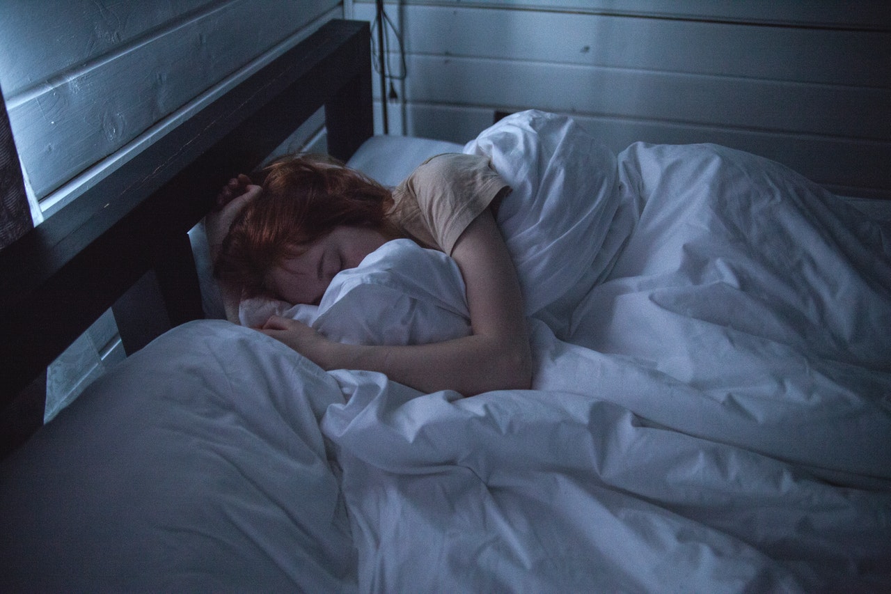 woman sleeping in a bed