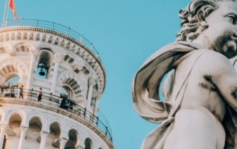statue-of-an-angel-and-the-pisa-tower