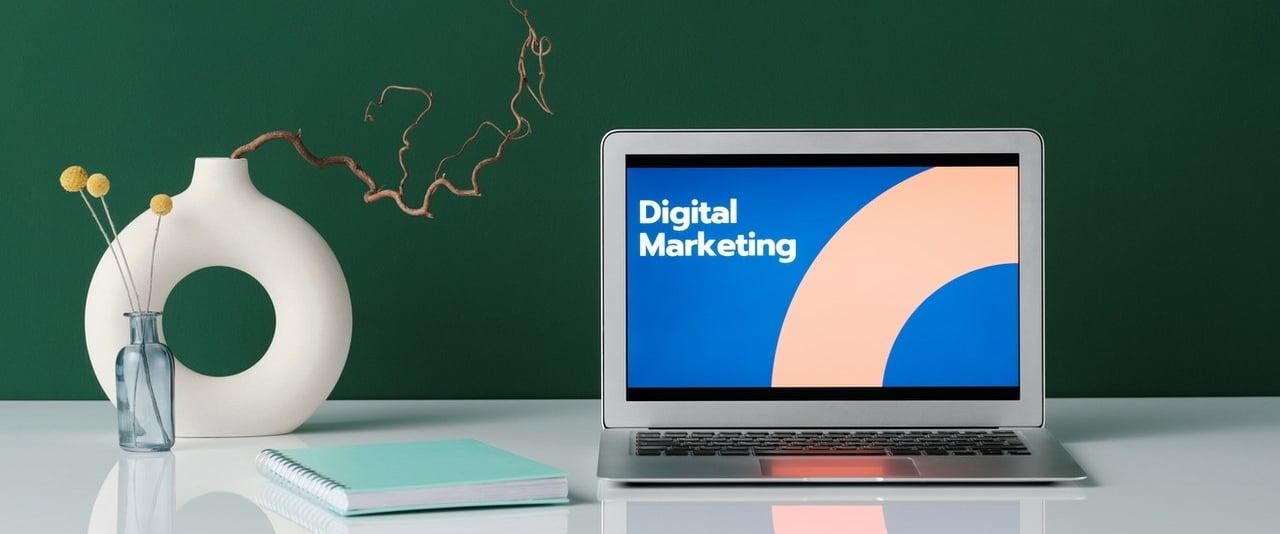 digital marketing presentation on a laptop sitting on a table